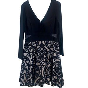 Xscape Women Long sleeve dress.